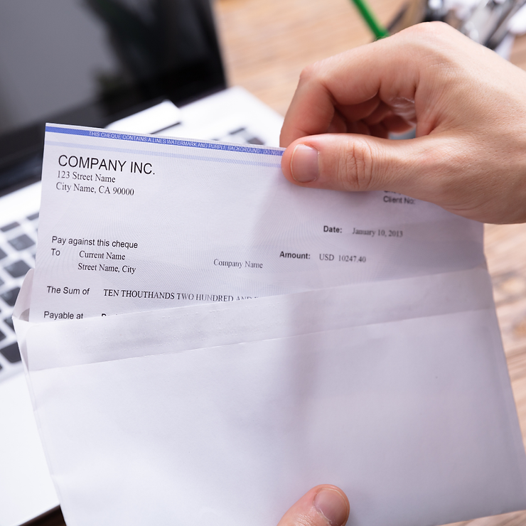 Person holding a paycheck from "company inc." with a value of $10,247.40, dated january 10, 2013, payable to "current name.